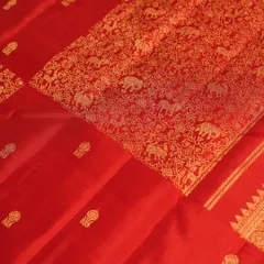 A closer look at the pallu, where the intricate weaving of the animal motifs is clearly visible, showcasing the skill of our artisans.