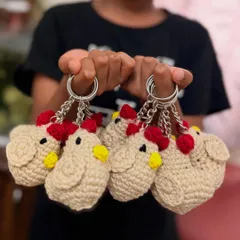 A handful of happiness. These cute crochet chicken keychains were a fun bulk order to work on. Their little faces and bright red combs are sure to make you smile.