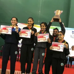 Victory tastes sweet. Here I am with our triumphant U-15 girls' team, celebrating a hard-earned gold medal at the Maharashtra state championship. This is what team spirit and dedication look like.