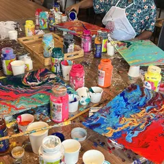 Yesterday was all about color and chaos at our fluid art workshop. The studio was a beautiful mess of poured paint and happy artists.