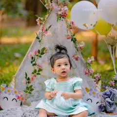 A little princess in her magical unicorn wonderland. This outdoor setup is perfect for a whimsical birthday.