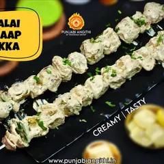 Soft, creamy, and melts in your mouth. Our Malai Chaap Tikka is marinated in a rich blend of cream and mild spices, then grilled to perfection. It's pure indulgence.