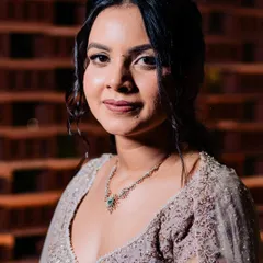 A close-up of Shilpi's elegant Sangeet look. She requested a soft glam style to go with her heavily embroidered lehenga. The result is a classic and timeless look that is both sophisticated and beautiful.