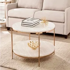 This elegant round center table features a two-tiered design with a beautiful rose gold finish. The white marble-like surfaces provide ample space for books and decor, making it a stylish and functional addition to any living room.