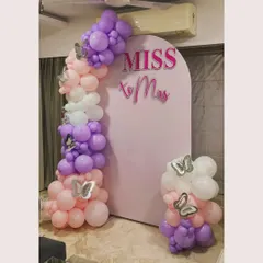 Here is the full view of the 'Miss to Mrs' bridal shower decoration. We balanced the main balloon garland on the left with a smaller arrangement on the right to create a complete and polished look, ensuring great photos from every angle.