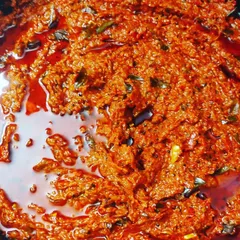 My spicy Pandumirapakaya pickle, made from fresh red chillies. This pickle has a unique, fiery taste that is a true Andhra specialty.
