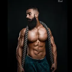 Strength isn't just about muscle, it's about presence. Here, I used a heavy battle rope as a prop to complement the athlete's powerful physique and intense expression, creating a raw and compelling image.