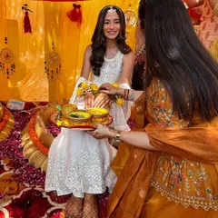 A closer look at Rhea's Haldi ceremony. She chose a subtle yet vibrant white sharara with gottapatti work. I styled it with a delicate matha patti and fresh flower hath phools for a look that was like a dream.