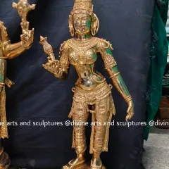 The goddess Bhoodevi, the earth goddess and consort of Vishnu, from a Balaji set. This piece is shown with a green oxide patina being applied, a finish that gives it an antique look.