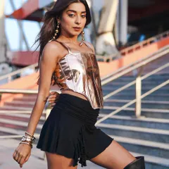 I love capturing powerful individual portraits that tell a story. This outdoor fashion shot uses the golden hour light and urban architecture to create a striking image for an actor's portfolio.