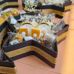 The star-shaped platter from my 'Chand Taara' collection. It complements the crescent moon platter perfectly and is filled with an assortment of gourmet goodies for Eid.