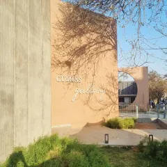 The entrance to the Cummins Gallery in North Bangalore showcases my approach to minimalist geometry and natural light. The simple forms and earthy tones create an immersive setting, where the architecture itself becomes a piece of art, playing with the shadows of nearby trees.