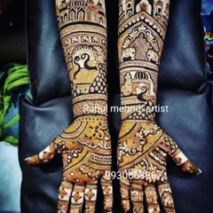 I can incorporate architectural elements into your bridal mehendi. This design features palace-style domes and jaali work, along with swans and elephants for a royal feel.