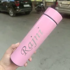 This pink steel bottle has been personalized with the name 'Rajni.' We can engrave your name on any steel bottle you choose from our store.