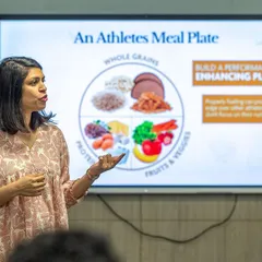 This is a core part of my teaching: how to build a performance-enhancing meal plate. In my workshops, I break down the roles of whole grains, lean protein, and fresh produce to give athletes a practical edge through proper nutrition.