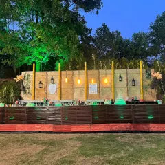 For a natural, earthy theme, we offer this expansive rustic bar setup. Its wooden slat design and warm lighting blend seamlessly into garden or palace ground settings.