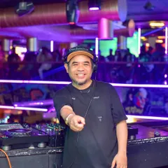 In my element, behind the decks, with my Technics gear. This is where the magic happens. I'm always ready to connect with the crowd and drop the perfect beat.