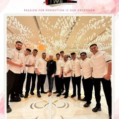 Our team of 15 bartenders in coordinated traditional attire, ready to serve at a grand reception at the Fairmont Doha.