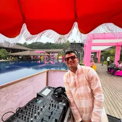 Another angle from the beautiful poolside setup. The vibrant decor and open air create the perfect setting for a day of celebration.