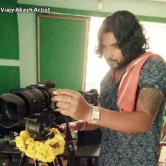 A throwback photo of me behind the camera. My journey in the creative field started long ago, and my passion for art has always been my driving force.