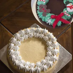 Decorate your own wreath cake or cheesecake! I provide the delicious base and all the fixings, like piped frosting and fondant accents, for you to assemble your own beautiful and festive dessert. The inset photo shows one possible creation!