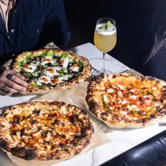 Why settle for one when you can have three? A table full of our artisanal pizzas is a beautiful sight, perfect for sharing and discovering new favourite toppings.