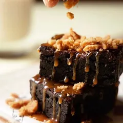 You have to try my 'Outta This World Brownie'. It's a rich, fudgy chocolate brownie, drizzled with decadent salted caramel and topped with a crunchy crumble. It's pure indulgence.