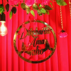 Another look at the custom signage, illuminated by a hanging Edison bulb. We focus on these small details to ensure the decor looks great from every angle.