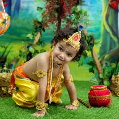 Capturing a playful moment during our Krishna themed shoot. We work patiently with each child to bring out their charming personality, resulting in photos filled with life.