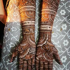 Mehndi for the whole family! This design was for the bride's sister-in-law, with "Jethani" and "Devar ki Shaadi" beautifully written into the intricate patterns on her arms.