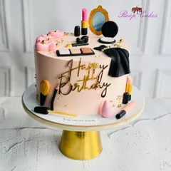 A cake for the beauty queen in your life. This "My Dream Room" themed cake is decorated with all-edible makeup items like lipstick, eyeshadow palettes, and brushes for a truly glamorous birthday.