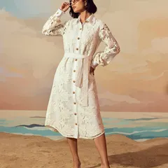 A full-length shot for Qala Clothing's "Casa Solana" collection. The painted backdrop and sand floor were part of a custom set we created to evoke a serene, seaside atmosphere for their resort wear line.