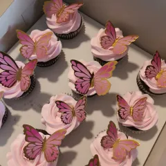 A box of my butterfly cupcakes ready for delivery. The pink-on-pink design with gold-trimmed butterflies is one of my most requested elegant designs.