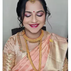 This lovely look was for a baby shower. I'll show you how to create a soft, celebratory glow with rosy eyeshadow and radiant skin.