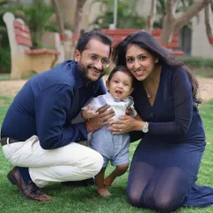 A happy family enjoying a day at the park. Outdoor family photoshoots have a relaxed and natural feel, perfect for capturing genuine smiles and interactions.