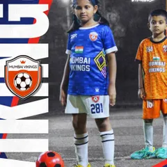 Our mini warriors, a boy and a girl, ready for their session. We welcome all kids to start their football story with us.
