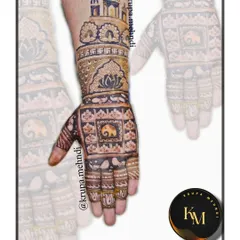 A heavy, intricate design for the bride's side. This pattern is filled with royal motifs like elephants and palaces, perfect for a grand celebration.