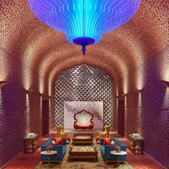 I designed this lounge at the Taj Devi Ratn Resort & Spa in Jaipur to be a sanctuary of quiet luxury. The space features a dramatic arched ceiling, custom furniture, and intricate wall textures, all coming together to create an experience of modern regality.