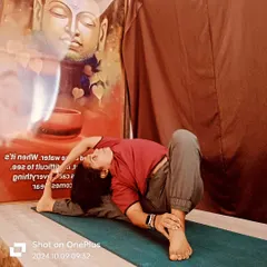 A variation of Parivrtta Janu Sirsasana (Revolved Head-to-Knee Pose). Twisting poses are powerful for detoxifying the body and releasing tension in the spine.