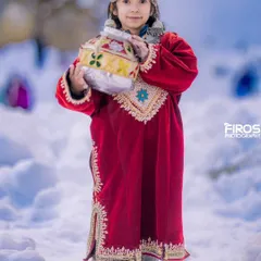 Another portrait of my daughter in a beautiful red Kashmiri Pheran. These personal photos are treasures, and I bring that same passion to capturing your family's memories.