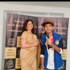 Addressing the camera during the red carpet segment. I am comfortable in front of the camera and skilled at hosting for both live audiences and broadcast.