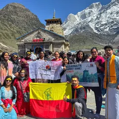 A proud moment for our group at the Kedarnath Temple, with the majestic Himalayas in the background. Bringing our Kannada pride to the mountains, this was a spiritual journey we organized as part of our Char Dham Yatra package.