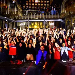 The entire team from VISA raising their hands to the beat. I love engaging with the audience and making everyone feel like they are a part of the show.