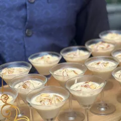 A classic dessert, elevated. I serve my creamy, nutty kheer in elegant martini glasses, garnished with slivered almonds for a sophisticated presentation.