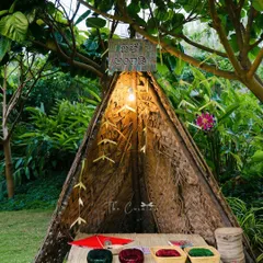This photobooth is not just a backdrop, but an interactive experience, bringing a touch of village charm and nostalgia to the celebration.