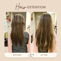 Here, the extensions were chosen to perfectly match and enhance her existing highlights. This creates a seamless blend and adds depth and dimension to the final wavy style.