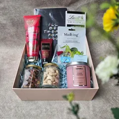 Because every friend is important. Treat your bestie to this personalized hamper filled with skincare, dry fruits, a scented candle, and a custom "I'll be there for you" notebook.