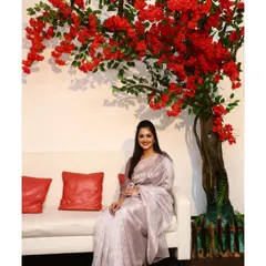 My studio features beautiful props like this red flower tree, perfect for adding a touch of nature and color to your indoor photoshoots.