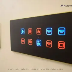 A closer look at the intuitive design of our backlit touch panels. The clear, illuminated icons for functions like lighting, fans, and curtains are easy to read day or night, with red and blue indicators showing the on/off status of each appliance.