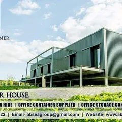 This container house features a sleek, dark metal exterior and an elevated design, perfect for a modern farmhouse or countryside residence. Our homes are fabricated with durable steel panels to withstand the elements.